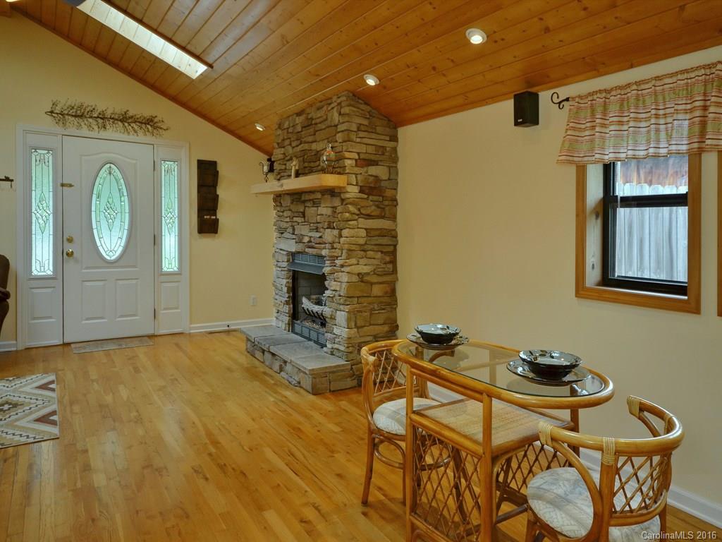 442 Thompson Cove Road Clyde, NC 28721 - Photo 13 of 20 a view of a livingroom with furniture and bathroom