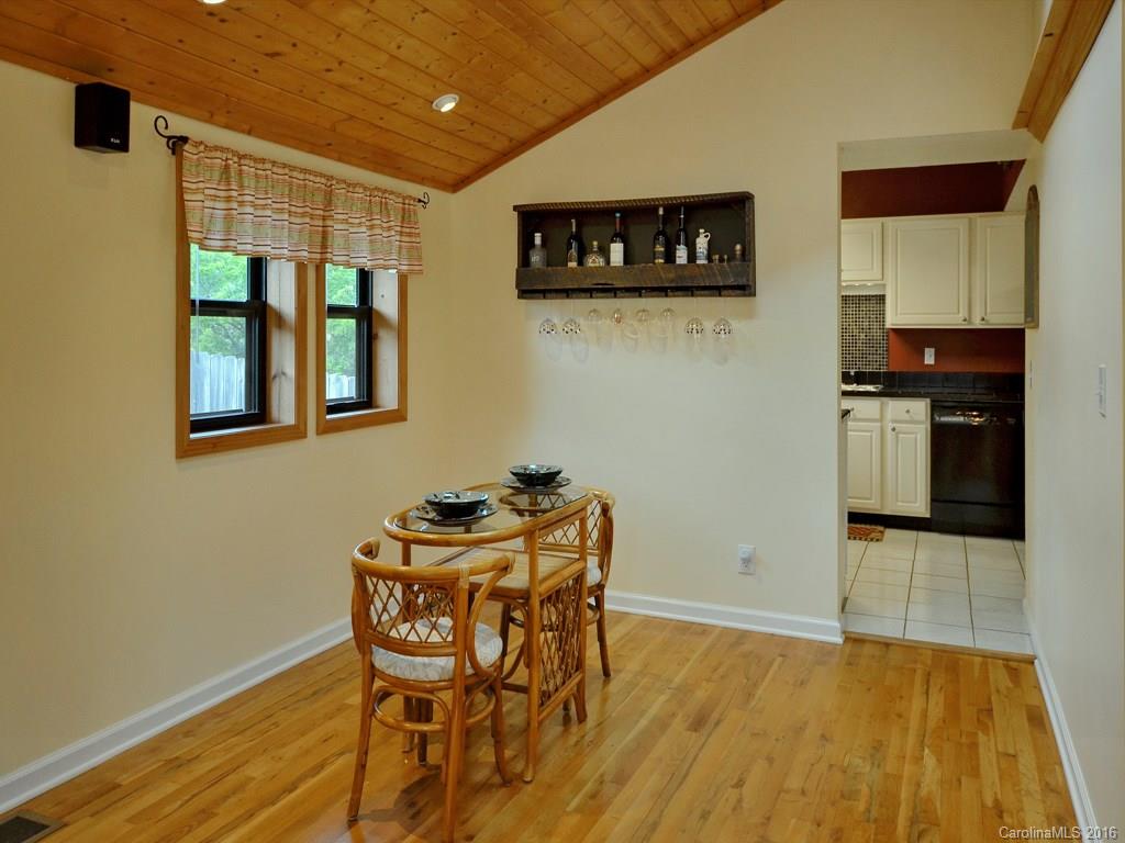 442 Thompson Cove Road Clyde, NC 28721 - Photo 5 of 20 a dining room with furniture and window