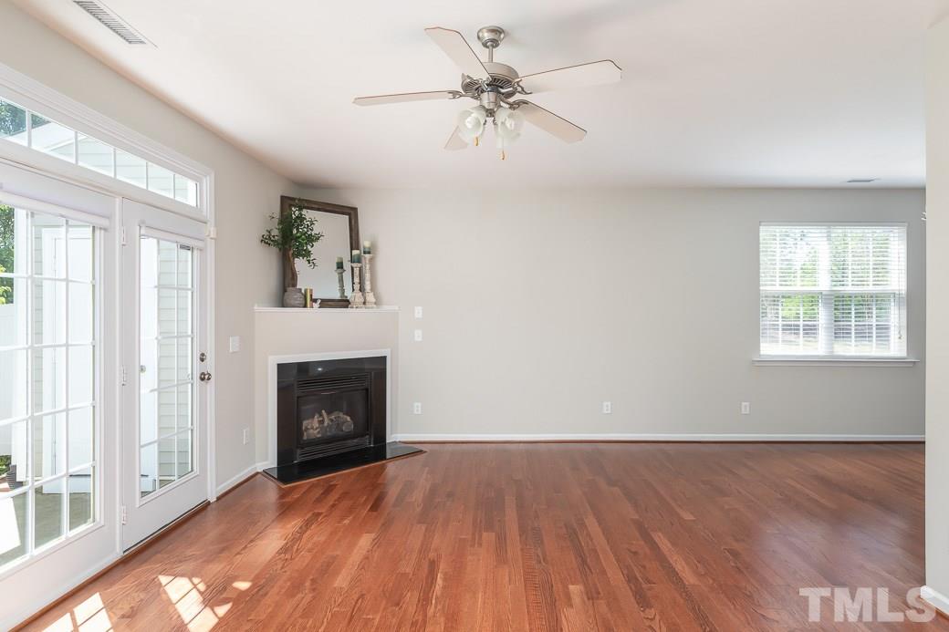 8212 Belneath Court Raleigh, NC 27613 - Photo 3 of 9 Cozy up with a GAS FIREPLACE in large Family Room.