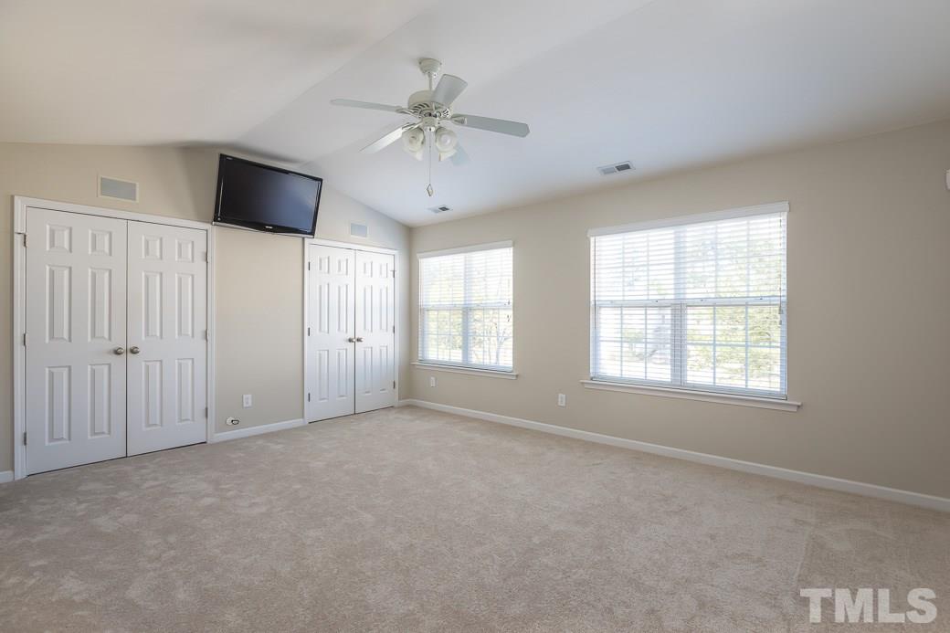 8212 Belneath Court Raleigh, NC 27613 - Photo 7 of 9 The Expansive Master Suite has HIS and HERS CLOSETS