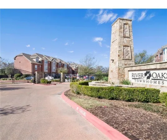 a city view with tall buildings and a street