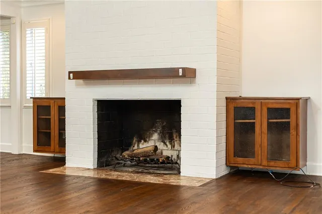 a living room with a fireplace