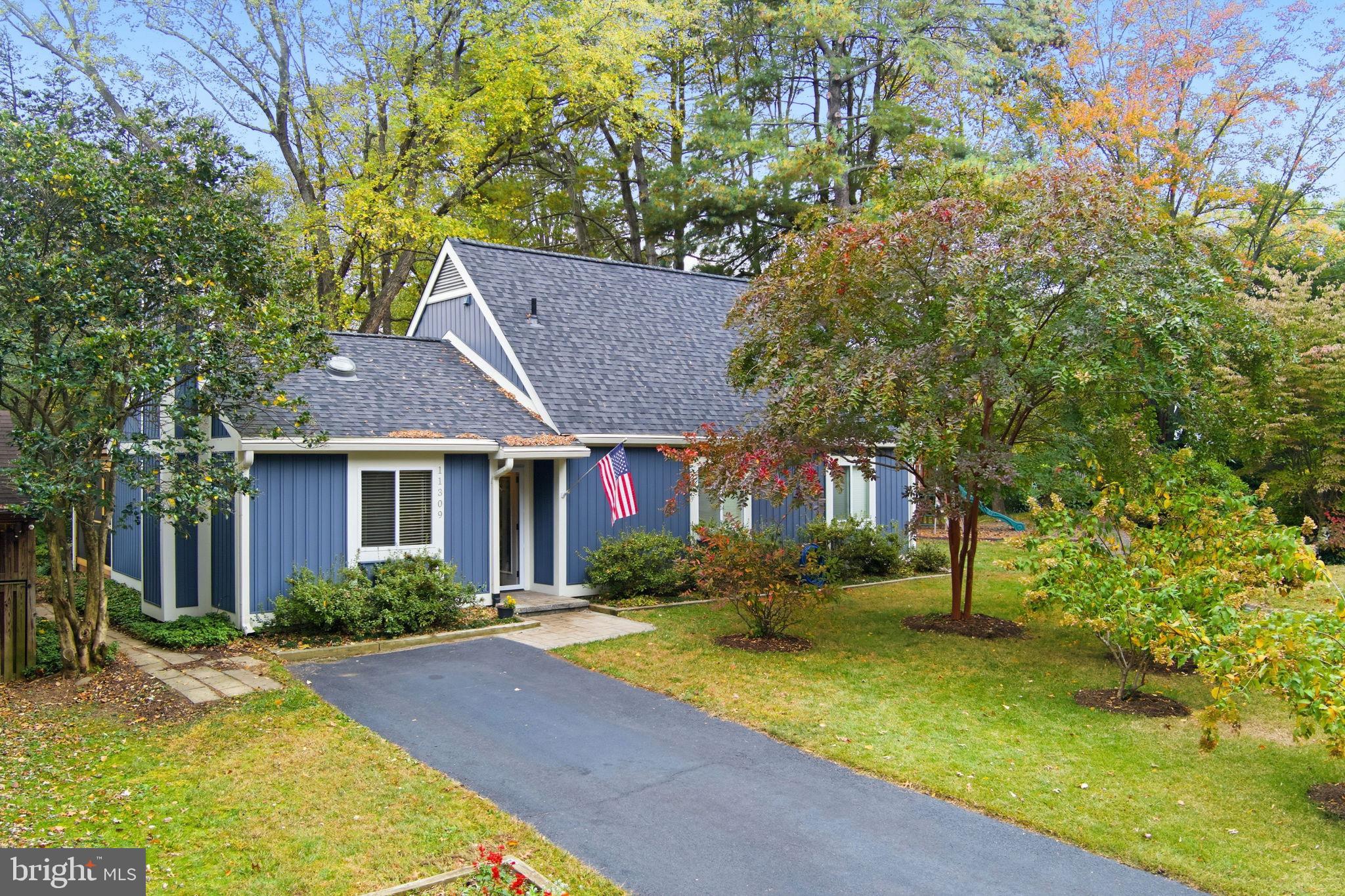 11309 Gatesborough Lane Reston, VA 20191 - Photo 2 of 85 Charming home with vibrant landscaping.