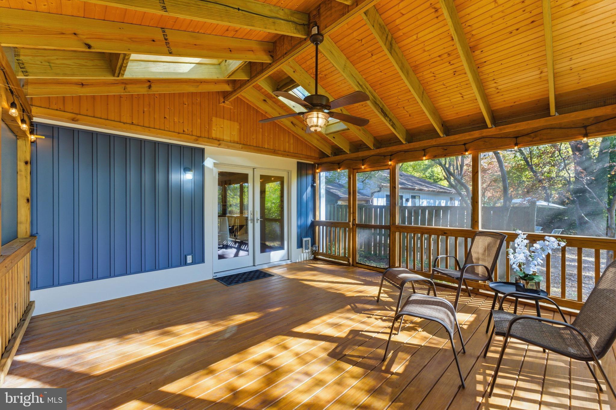 11309 Gatesborough Lane Reston, VA 20191 - Photo 23 of 85 Charming sunlit porch with rustic appeal.