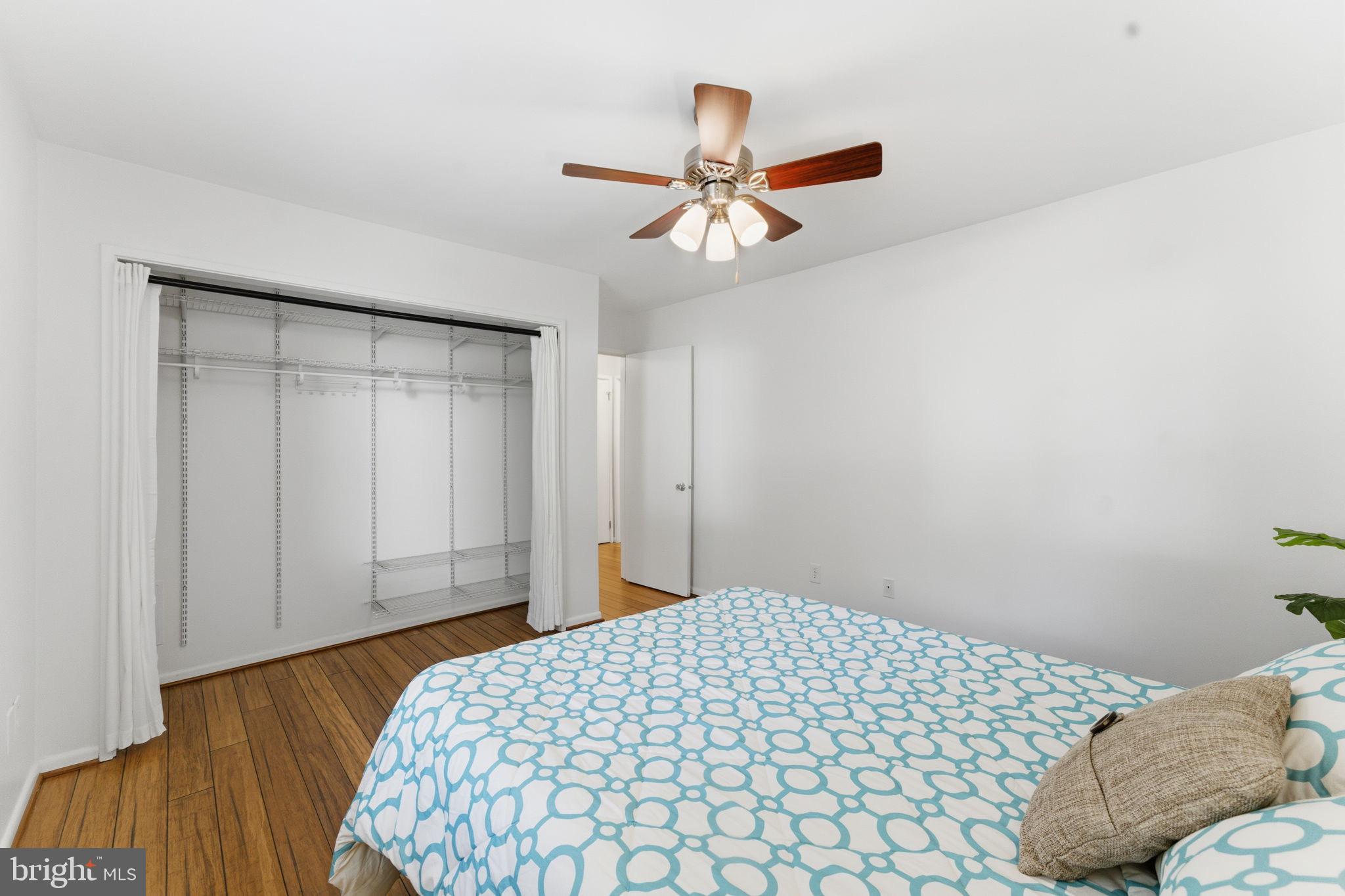 11309 Gatesborough Lane Reston, VA 20191 - Photo 34 of 85 a bedroom with a bed and a closet