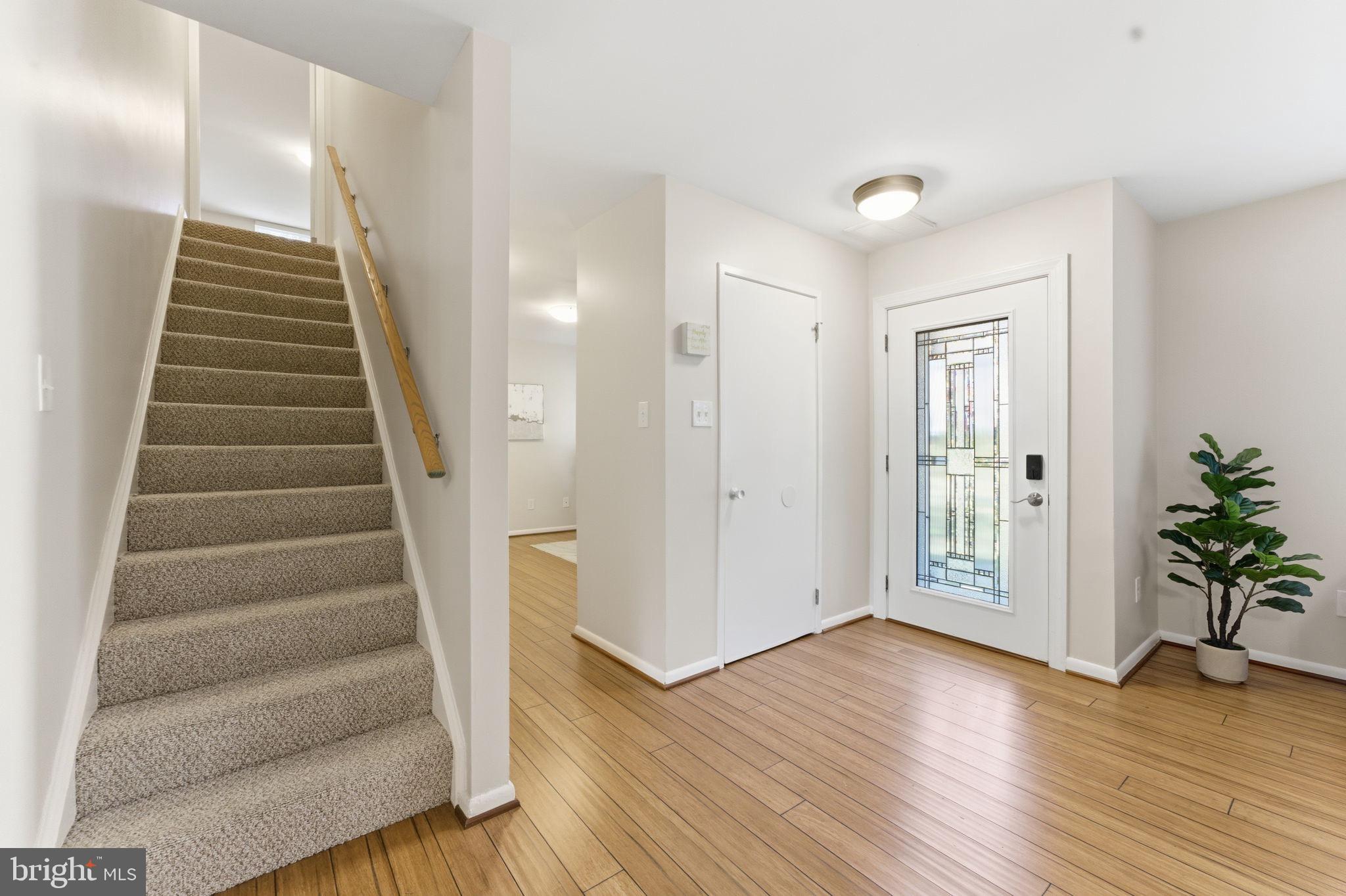 11309 Gatesborough Lane Reston, VA 20191 - Photo 37 of 85 a view of entryway with wooden floor