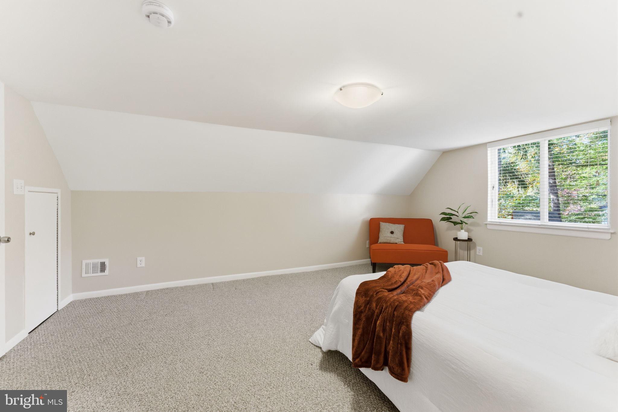 11309 Gatesborough Lane Reston, VA 20191 - Photo 39 of 85 a bedroom with a bed and window
