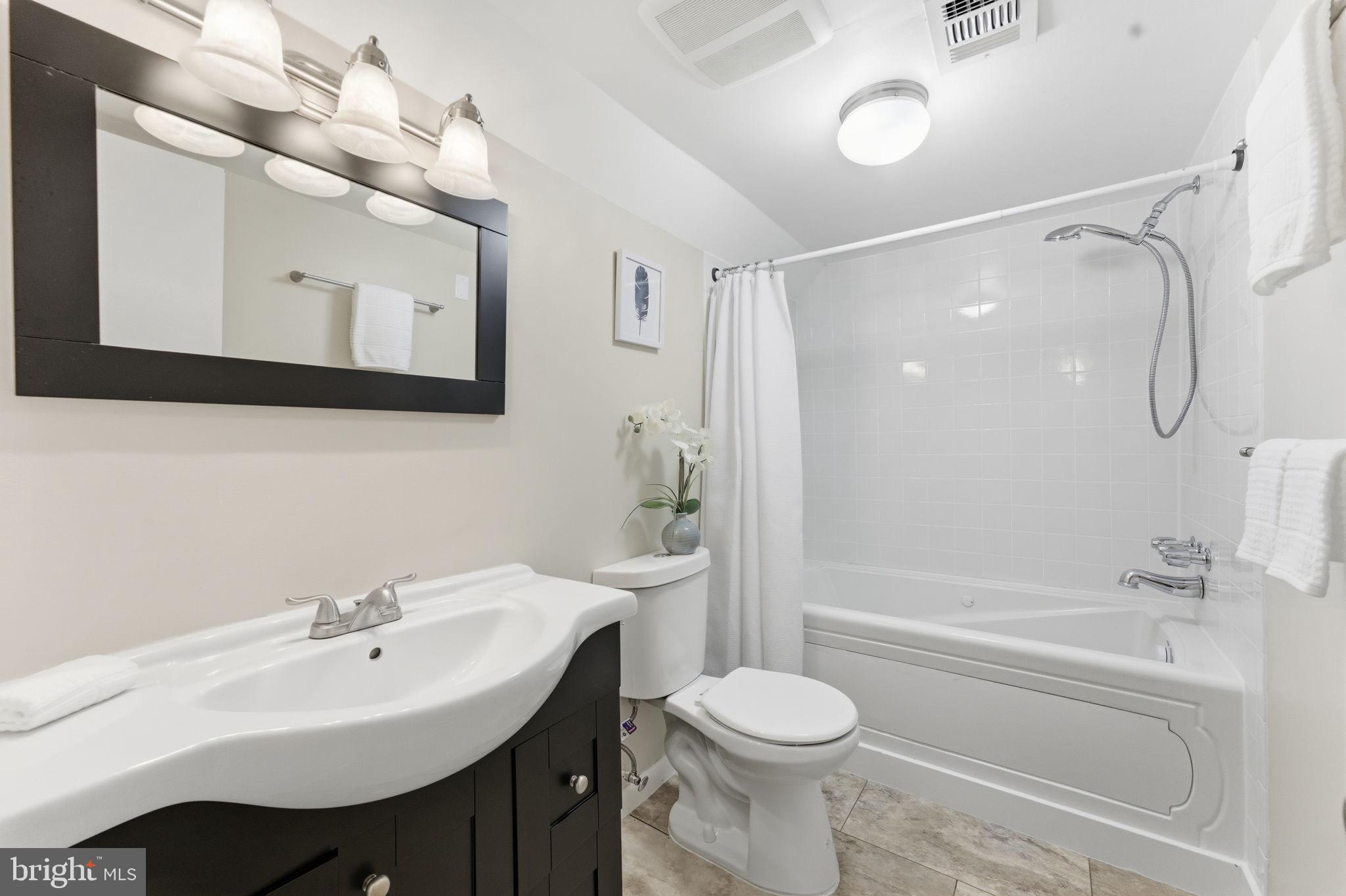 11309 Gatesborough Lane Reston, VA 20191 - Photo 42 of 85 Modern bathroom with elegant fixtures.