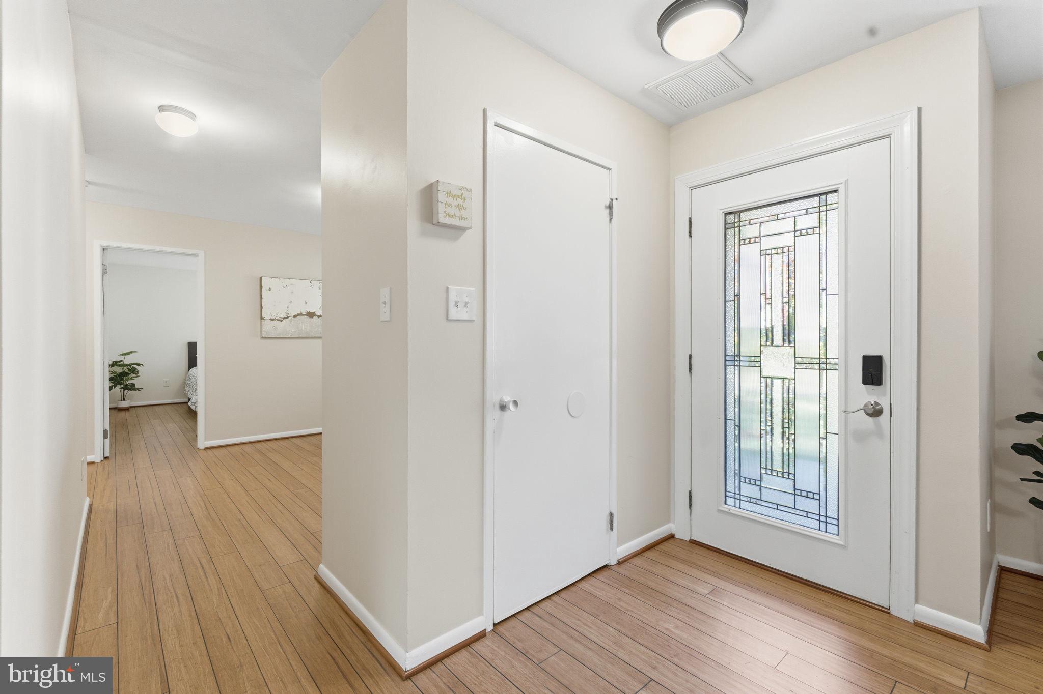 11309 Gatesborough Lane Reston, VA 20191 - Photo 6 of 85 a view of hallway with wooden floor