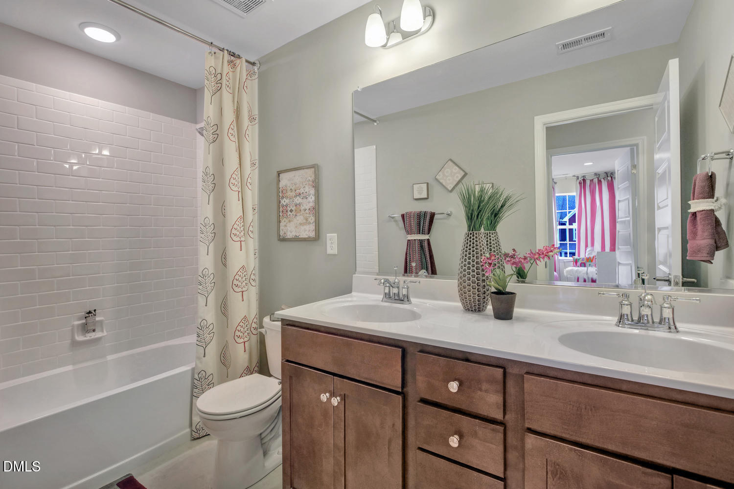 318 Short Ridge Way Rolesville, NC 27571 - Photo 11 of 22 a bathroom with a sink a toilet and shower