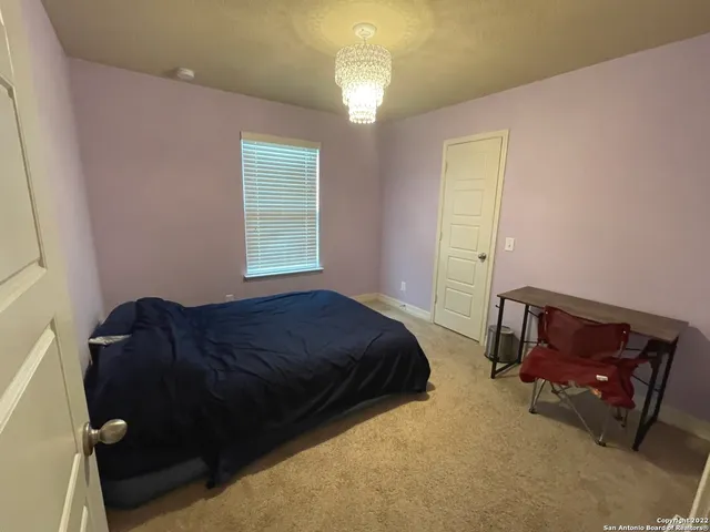 a view of a balcony with wooden floor