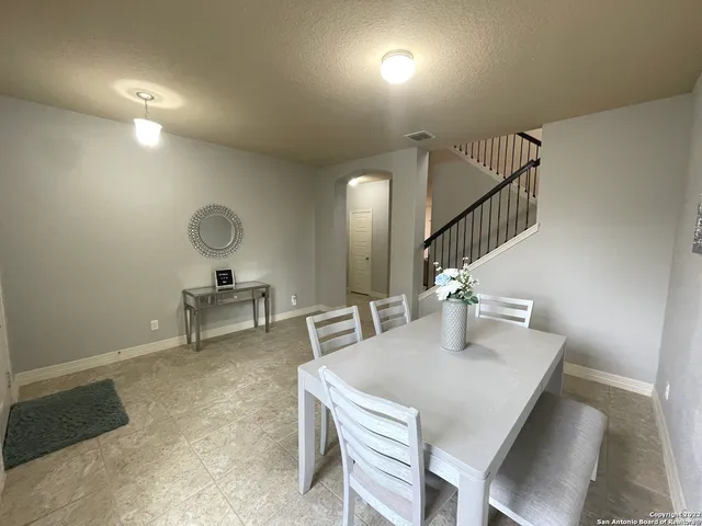 a view of a dining room with furniture