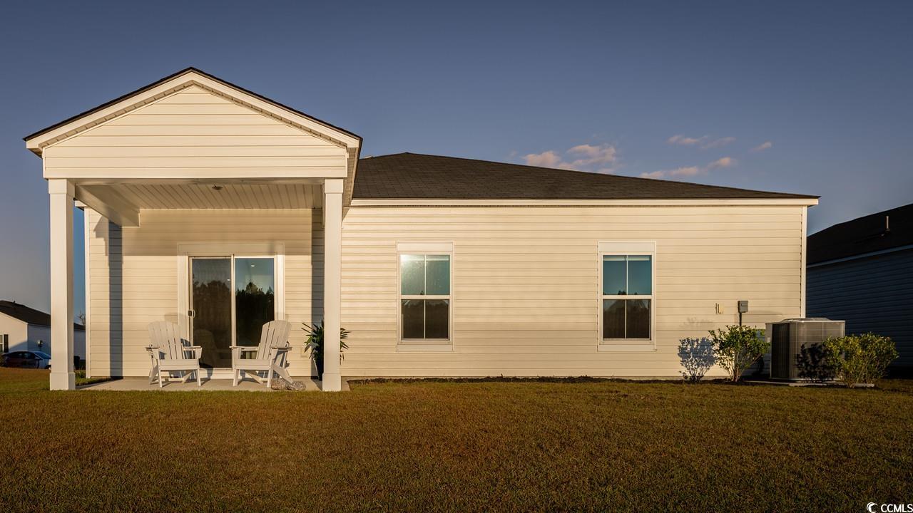 167 Fox Rae Drive Conway, SC 29526 - Photo 5 of 25 Rear view of house with a patio area and a yard