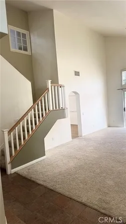 a view of balcony with wooden floor