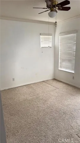 en empty room with windows