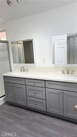 a sink with a mirror