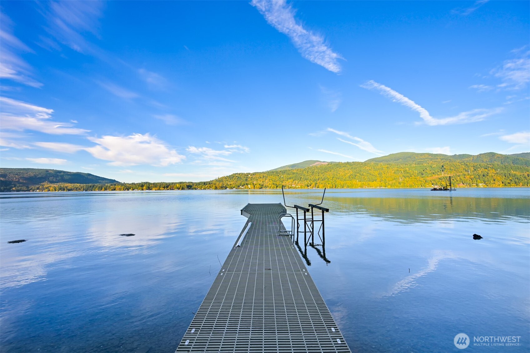 a view of a lake with a outdoor space