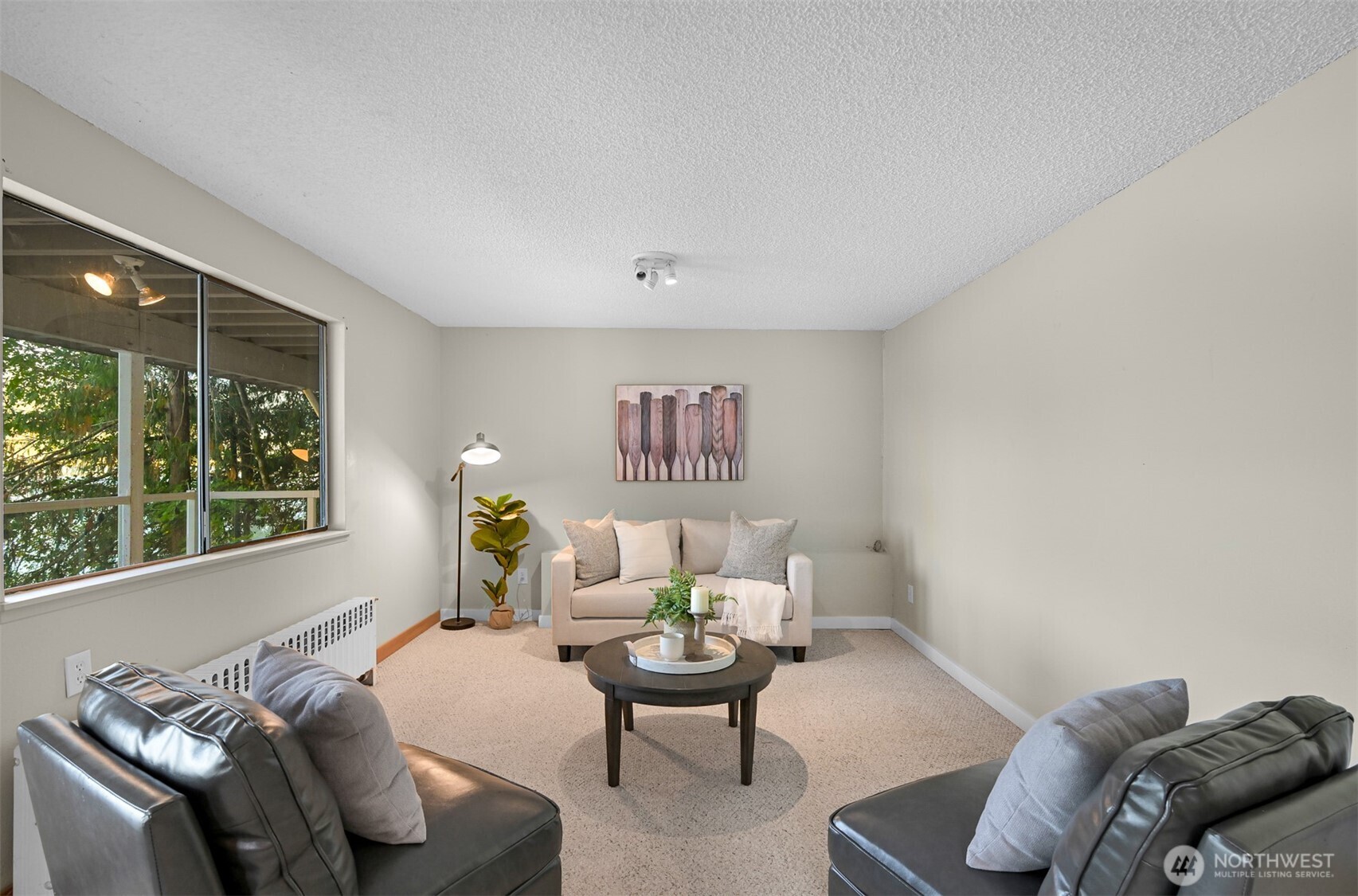 2550 Lake Whatcom Boulevard Bellingham, WA 98229 - Photo 29 of 38 a living room with furniture and a large window