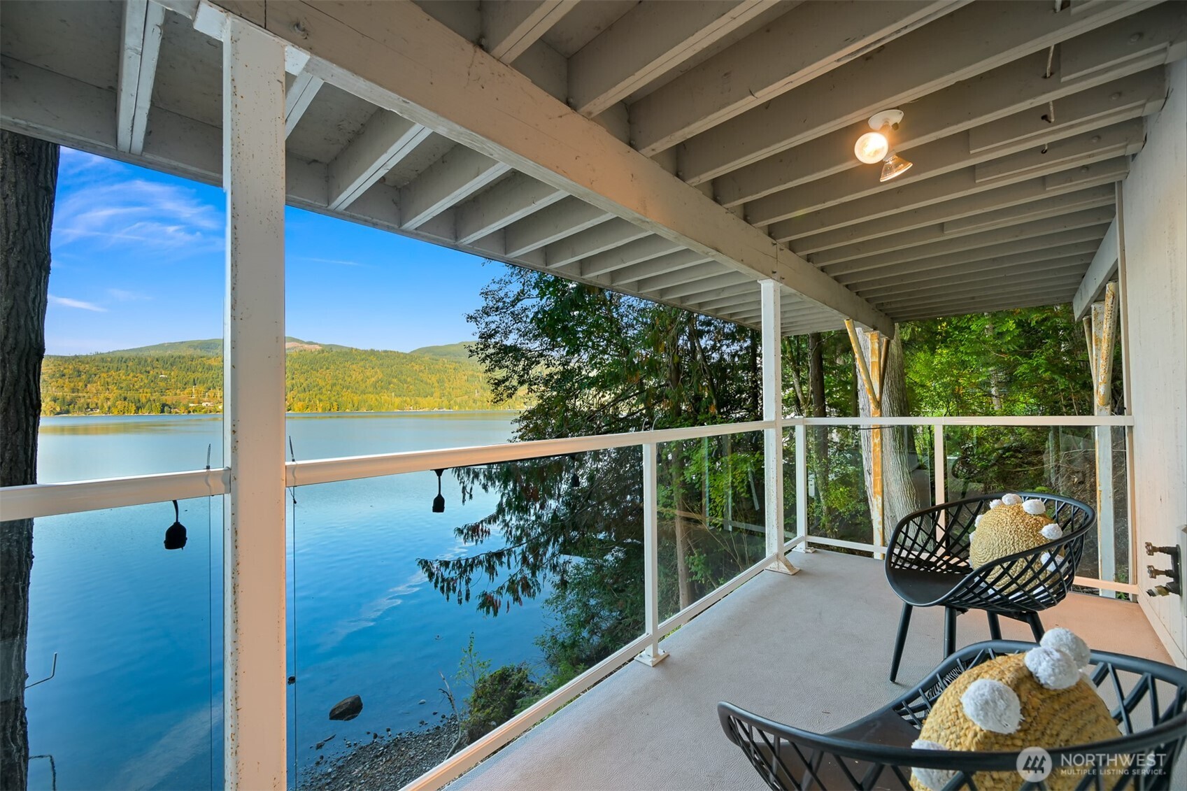 2550 Lake Whatcom Boulevard Bellingham, WA 98229 - Photo 31 of 38 a balcony with table and chairs