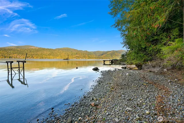 a backyard of a house with outdoor seating