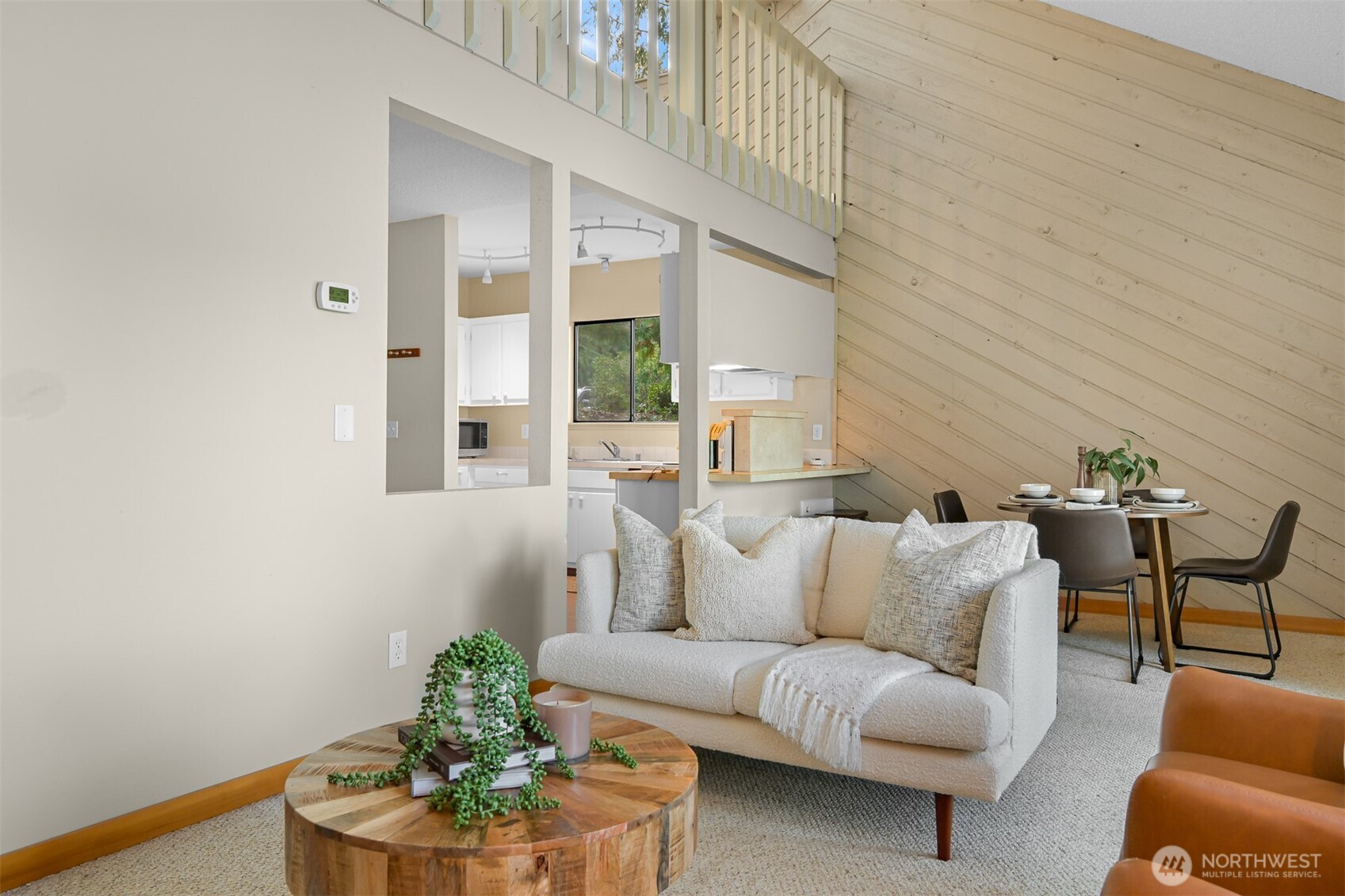 2550 Lake Whatcom Boulevard Bellingham, WA 98229 - Photo 6 of 38 a living room with furniture and a potted plant
