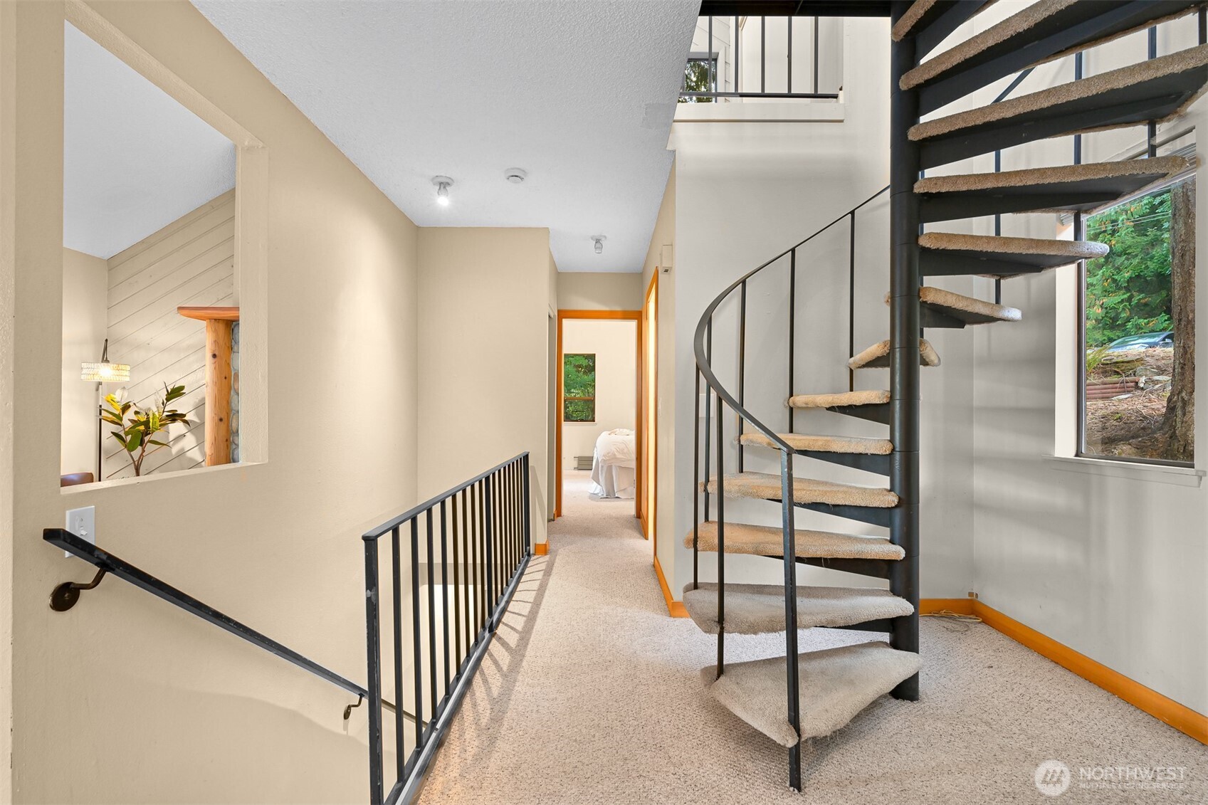 2550 Lake Whatcom Boulevard Bellingham, WA 98229 - Photo 9 of 38 a view of staircase with lots of frames on wall and a window
