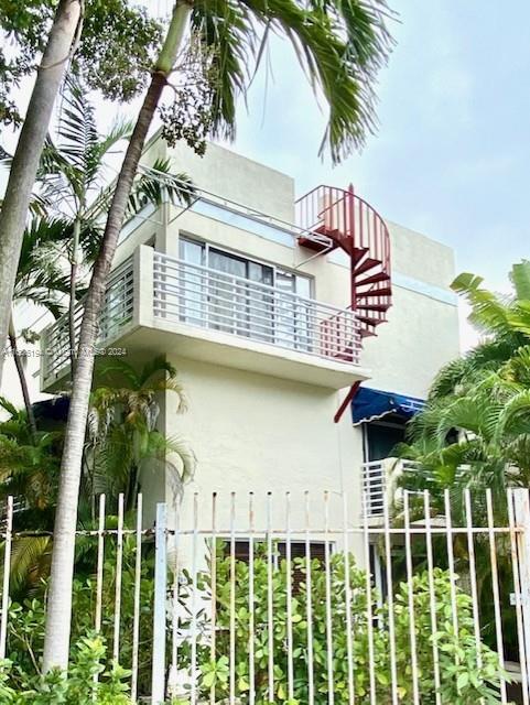 3099 Oak Avenue, Unit 1 Miami, FL 33133 - Photo 2 of 2 a view of a house with a flower garden
