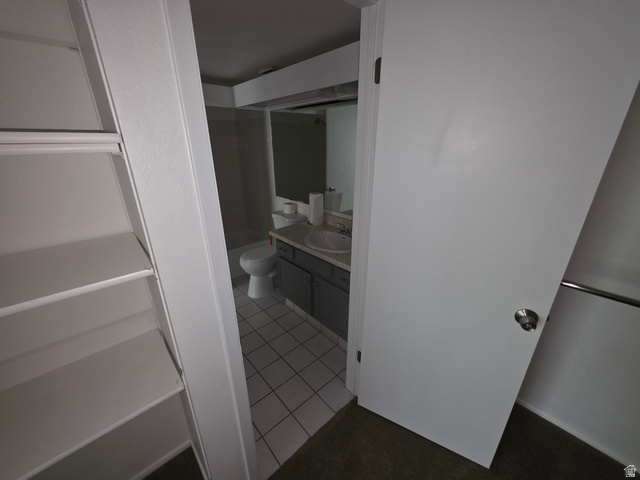 6852 Countrywoods Circle, Unit 5D Midvale, UT 84047 - Photo 25 of 50 Bedroom, walk in closet entrance to bathroom.