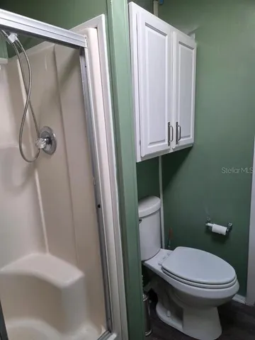 a bathroom with a sink and toilet