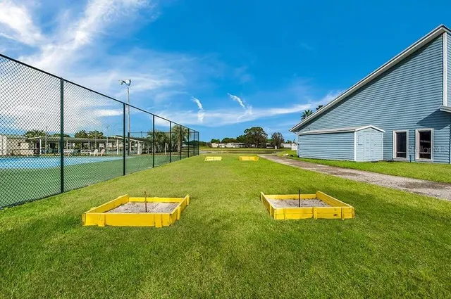a view of a house with a big yard