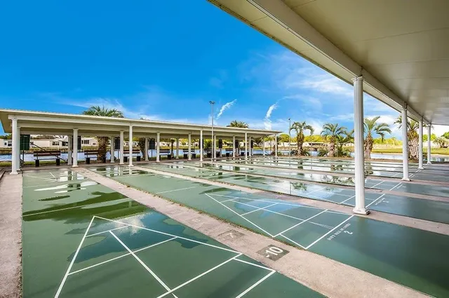 a view of a swimming pool with a patio