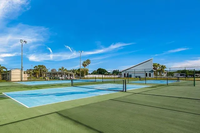 a view of lawn tennis court