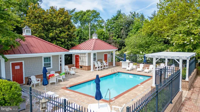 an outdoor space with seating area and furniture