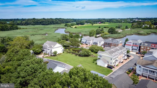 an aerial view of a house with outdoor space and city view