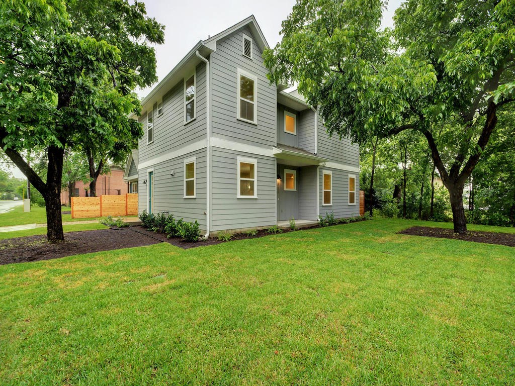 5200 Eilers Avenue Austin, TX 78751 - Photo 1 of 1 a front view of a house with a garden