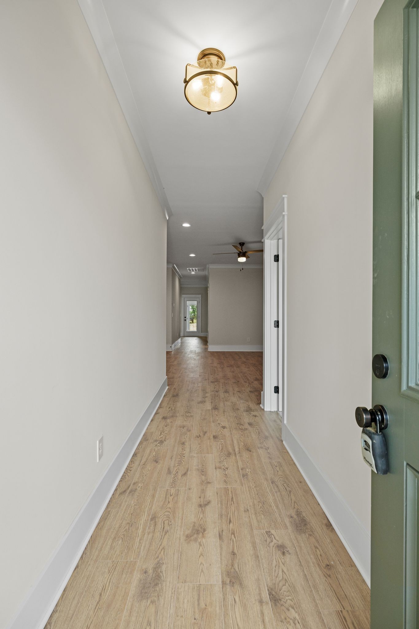 2039 Grace Johns Circle Murfreesboro, TN 37128 - Photo 12 of 33 a view of a hallway with wooden floor