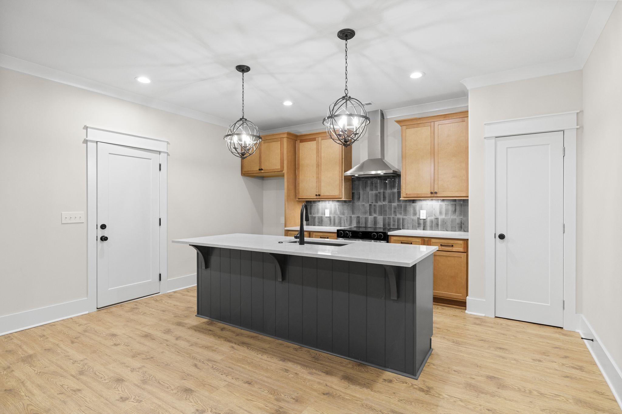 2039 Grace Johns Circle Murfreesboro, TN 37128 - Photo 19 of 33 a kitchen with kitchen island stainless steel appliances a sink stove and refrigerator