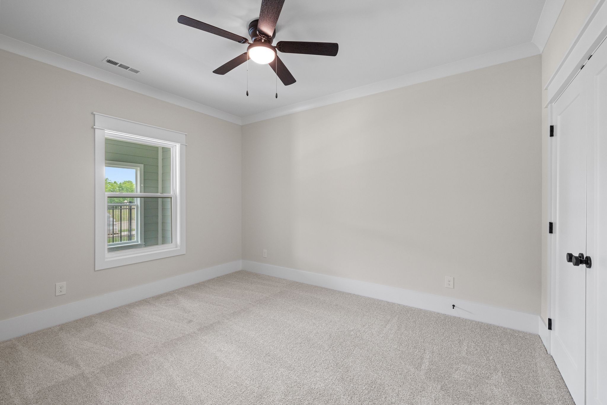 2039 Grace Johns Circle Murfreesboro, TN 37128 - Photo 23 of 33 an empty room with a window and a fan