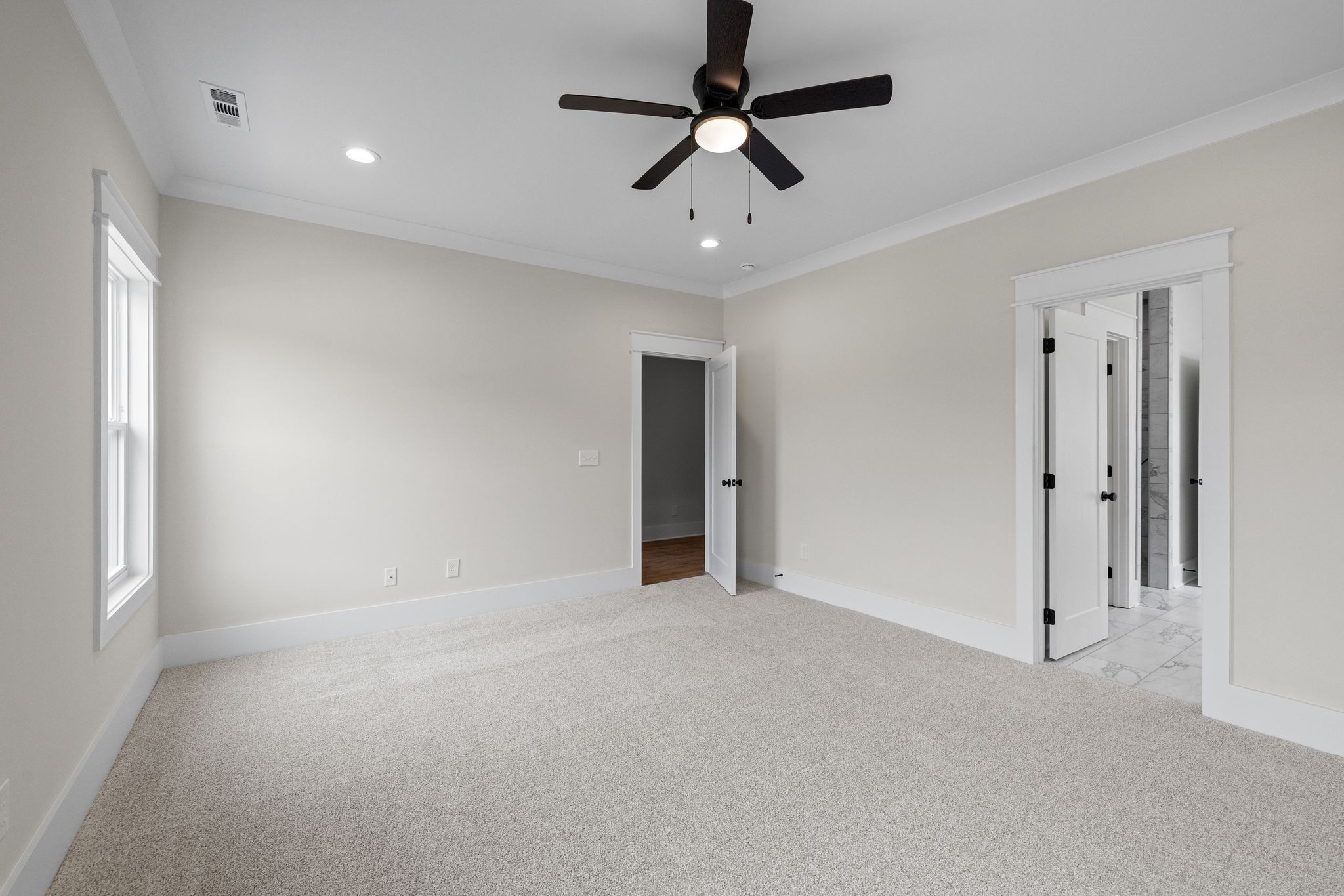 2039 Grace Johns Circle Murfreesboro, TN 37128 - Photo 28 of 33 an empty room with ceiling fan and window