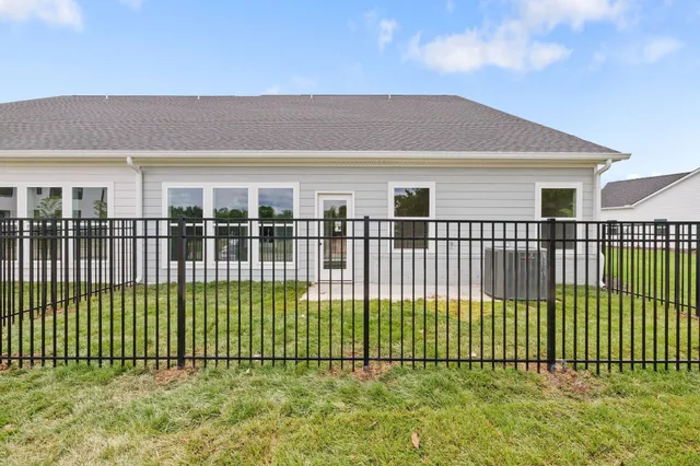 a view of backyard with deck