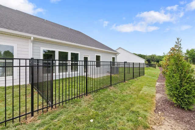a view of house with street