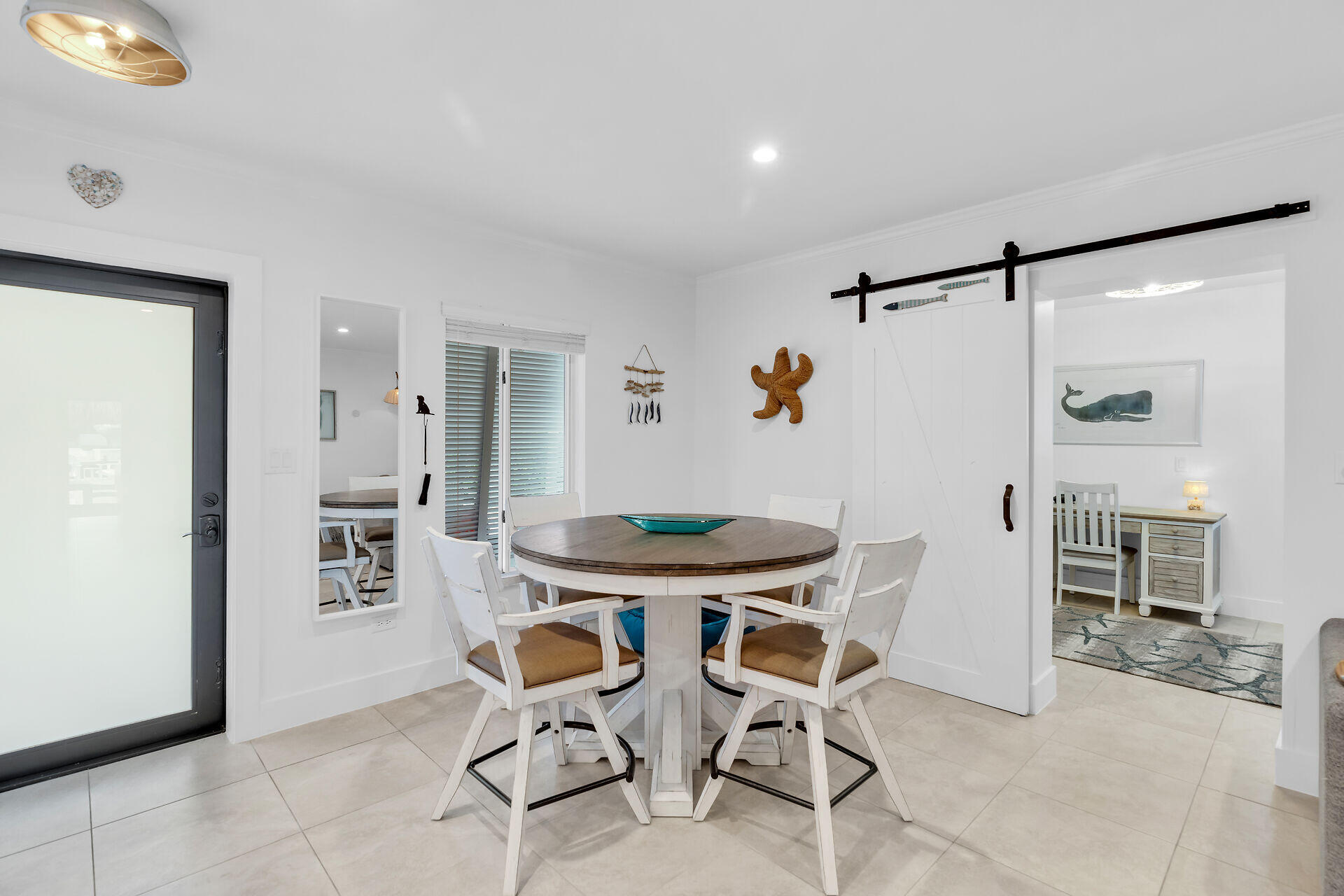 181 Ocean View Drive Key Largo, FL 33037 - Photo 11 of 52 a dining room with furniture and window