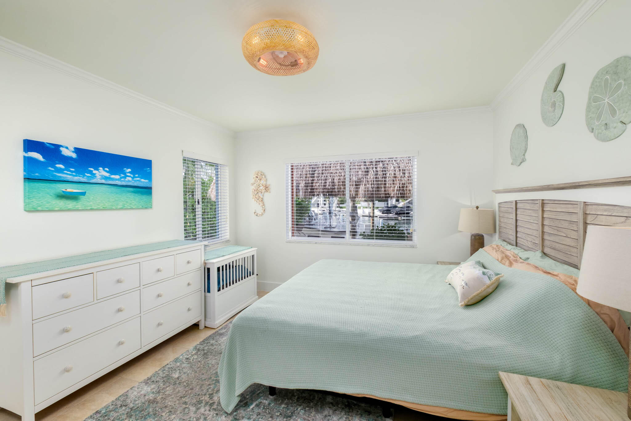 181 Ocean View Drive Key Largo, FL 33037 - Photo 37 of 52 a bedroom with a bed and window