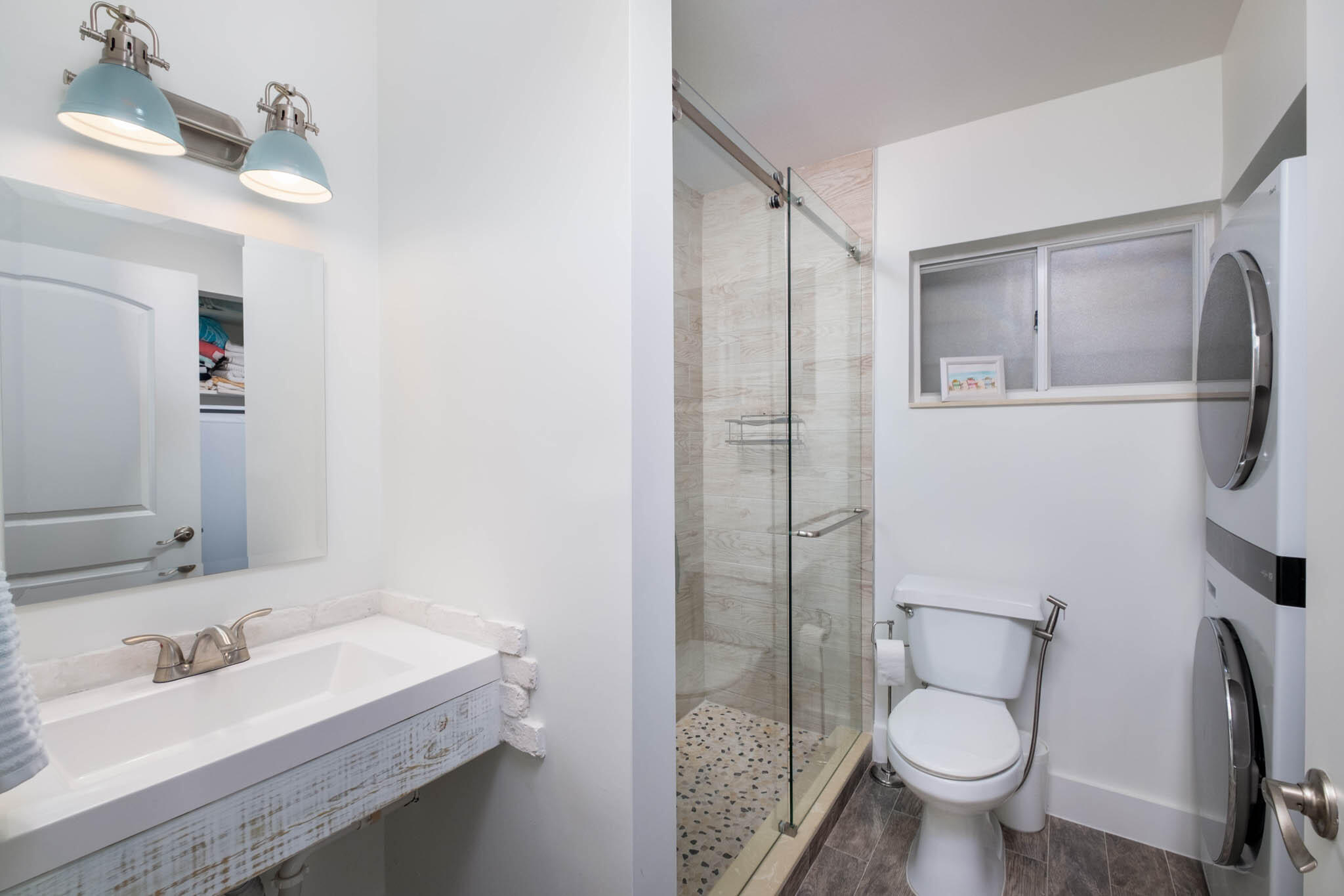 181 Ocean View Drive Key Largo, FL 33037 - Photo 42 of 52 a bathroom with a sink toilet and shower