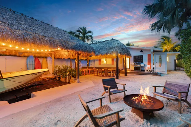 a view of a chairs and tables in the patio