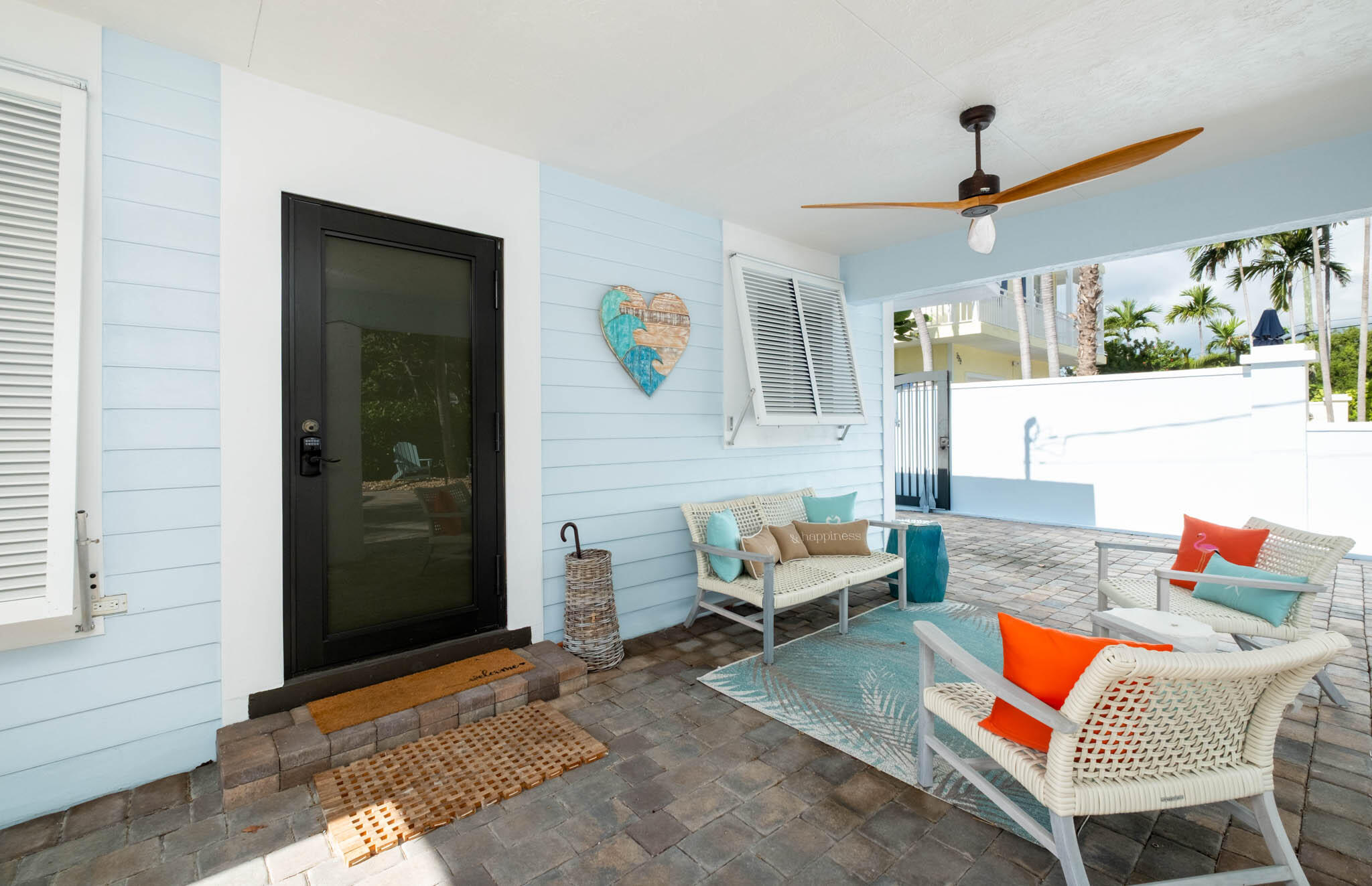181 Ocean View Drive Key Largo, FL 33037 - Photo 8 of 52 a outdoor living space with furniture and a rug