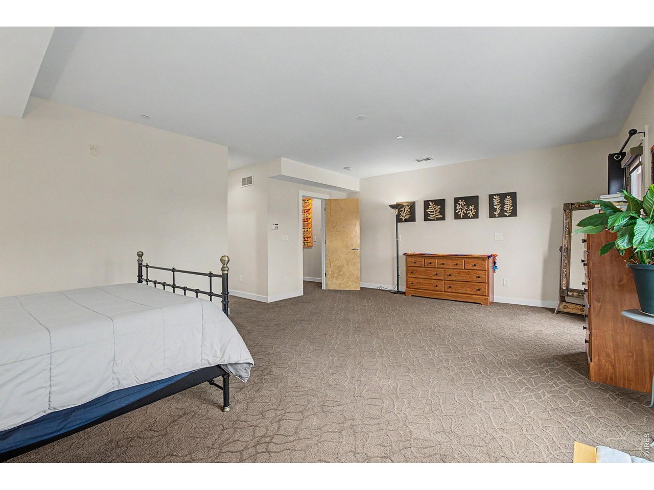 5055 Ralston Street, Unit A Boulder, CO 80304 - Photo 15 of 50 a bedroom with a bed and a couch