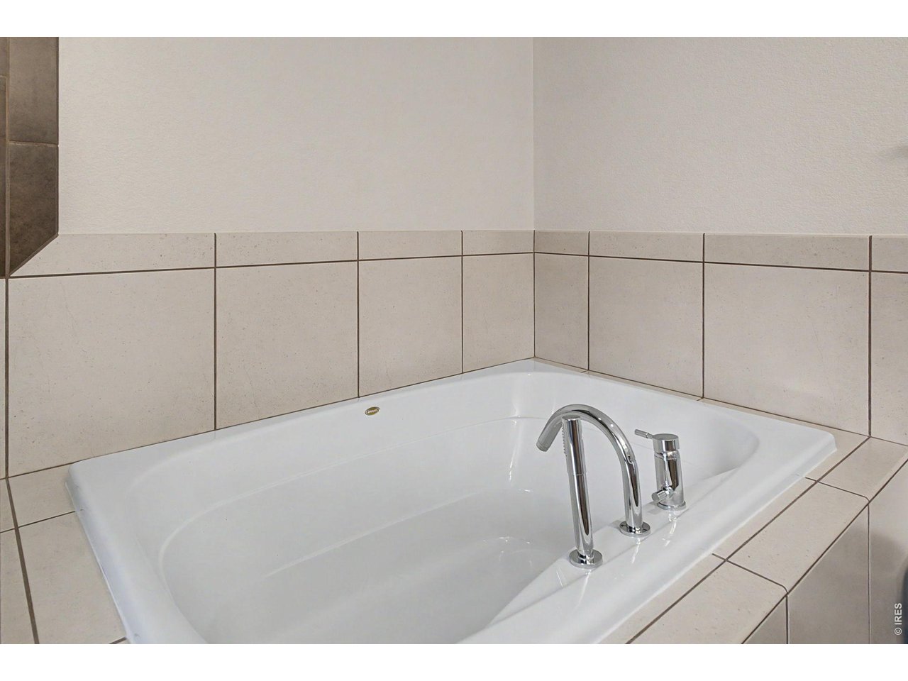 5055 Ralston Street, Unit A Boulder, CO 80304 - Photo 19 of 50 a close view of a sink and a vanity in the bathroom