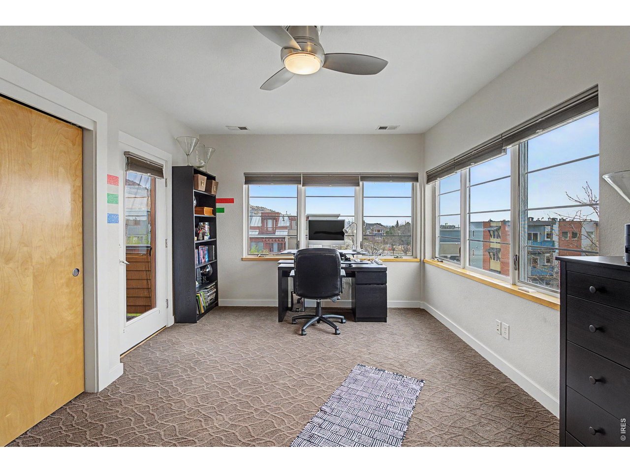 5055 Ralston Street, Unit A Boulder, CO 80304 - Photo 28 of 50 a work room with furniture and a large window