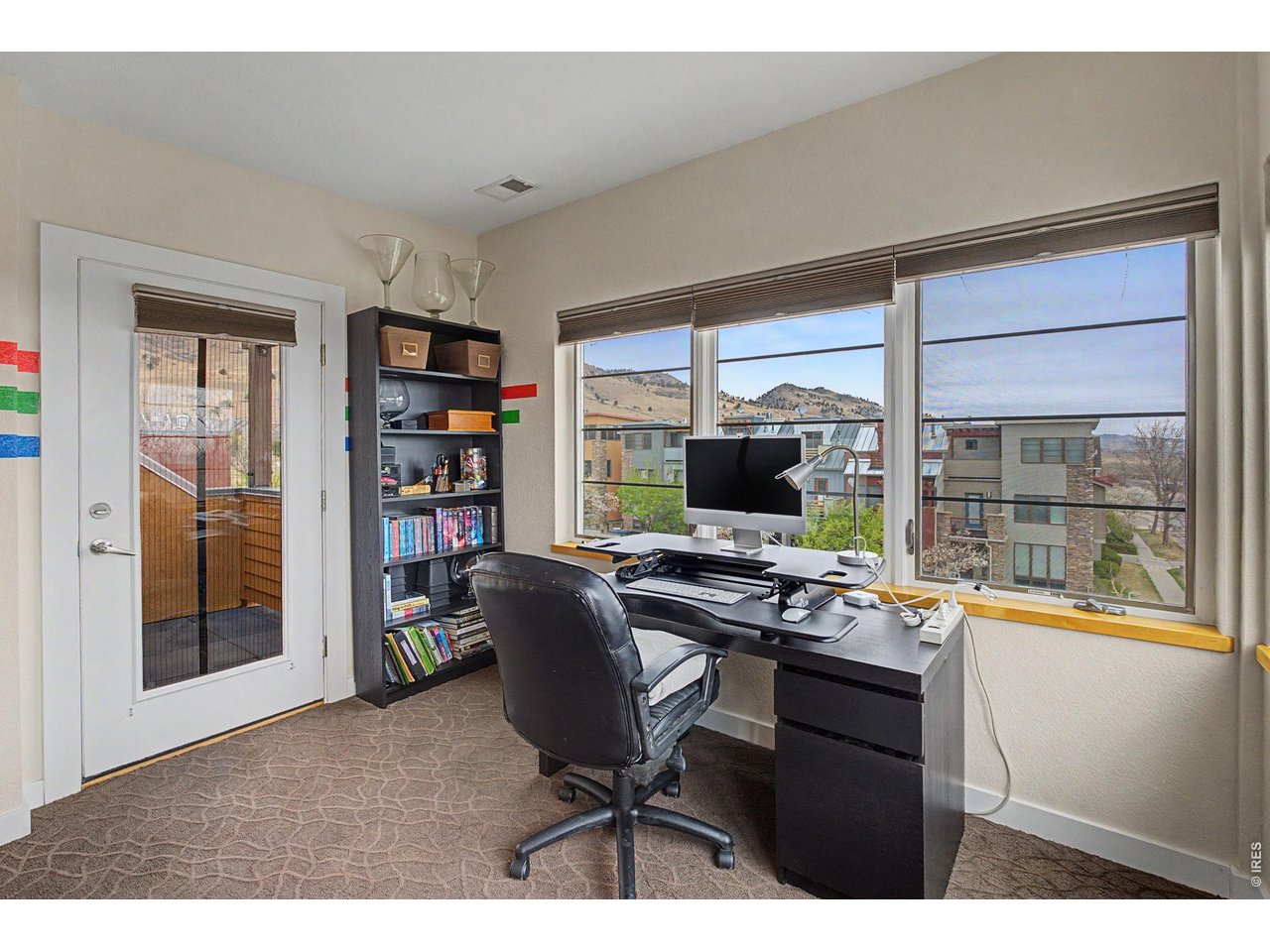 5055 Ralston Street, Unit A Boulder, CO 80304 - Photo 29 of 50 a view of a workspace with furniture and a window